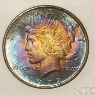 1922 Silver Peace Dollar,  Unbelievable Rainbow Toned Coin In Slab