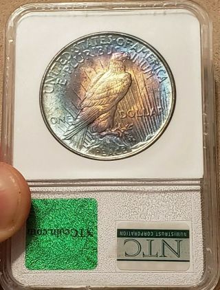 1922 Silver Peace Dollar,  unbelievable RAINBOW TONED coin in slab 4