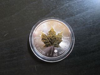 2016 Canada " Gilded ".  9999 Silver Maple Leaf (1 Troy Ounce)