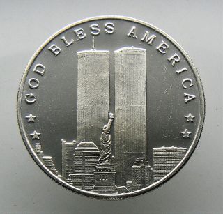 1 Oz Silver Round.  999 Pure " God Bless America " Twin Towers 9/11,  2001