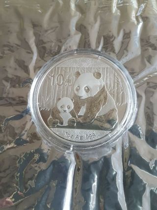 2012 China Panda Coin 1 Oz.  999 Fine Silver 10 Yuan Chinese In Capsule.