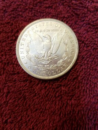 1880 - O Morgan silver dollar in AU.  505 4