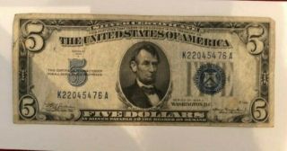 1934 - A U.  S $5 Five Dollar Blue Seal Bill Silver Certificate