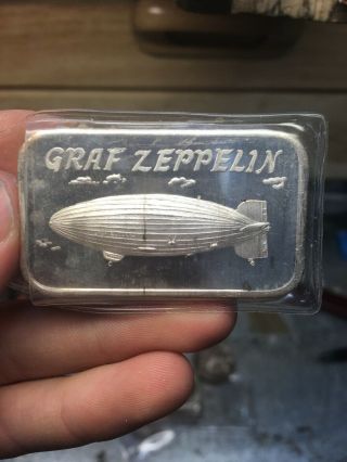 1930 Graf Zeppelin First Europe Pan American Round Trip Ounce.  999 Silver Bar