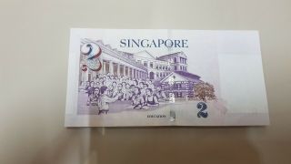 SINGAPORE 2 DOLLAR ND XF - AUNC PAPER EDITION PORTRAIT SERIES S/N 599588 2