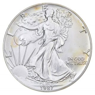 Better Date 1987 American Silver Eagle 1 Troy Oz.  999 Fine Silver 090