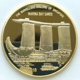 L3195,  Korea " Marina Bay Sands " Singapore Fair Brass Coin 5 Won.  2016