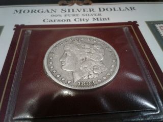 1883 Cc $1 Morgan Carson City Silver,  W/ Collector Album & Stamps.  Pkg