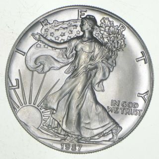 Better Date 1987 American Silver Eagle 1 Troy Oz.  999 Fine Silver 160