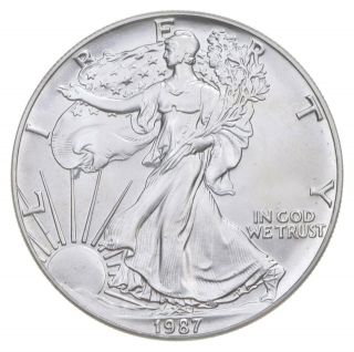 Better Date 1987 American Silver Eagle 1 Troy Oz.  999 Fine Silver 042
