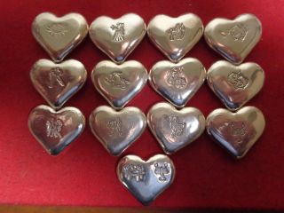 1 Troy Ounce.  999 Fine Silver.  Hand Poured Zodiac Sign Heart Design Ingot Mfs