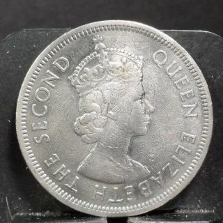 Circulated 1960 One Dollar Hong Kong Coin (10318) 3,
