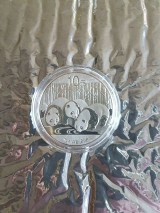 2013 China Panda Coin 1 Oz.  999 Fine Silver 10 Yuan Chinese In Capsule.
