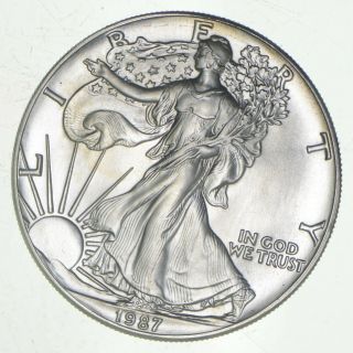 Better Date 1987 American Silver Eagle 1 Troy Oz.  999 Fine Silver 431