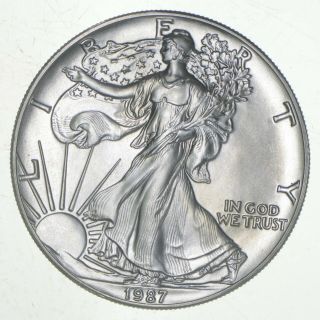 Better Date 1987 American Silver Eagle 1 Troy Oz.  999 Fine Silver 154