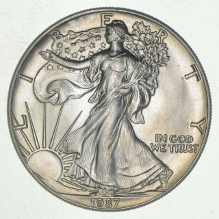Better Date 1987 American Silver Eagle 1 Troy Oz.  999 Fine Silver 345