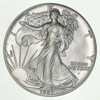 Better Date 1987 American Silver Eagle 1 Troy Oz.  999 Fine Silver 381