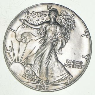 Better Date 1987 American Silver Eagle 1 Troy Oz.  999 Fine Silver 379