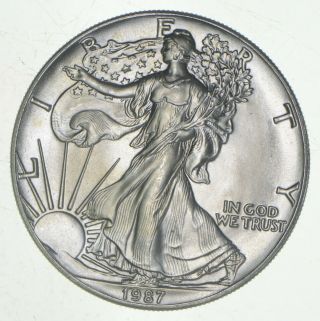 Better Date 1987 American Silver Eagle 1 Troy Oz.  999 Fine Silver 158