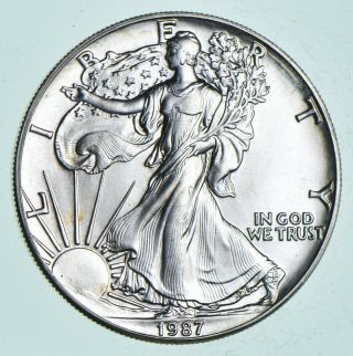Better Date 1987 American Silver Eagle 1 Troy Oz.  999 Fine Silver 185