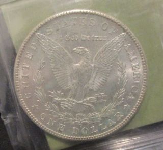 BU 1902 - O Morgan Silver Dollar - OLD IGA Independent Grading Assoc. ,  Inc.  730130 3