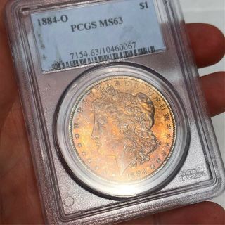 1884 - OPcgs MS63 rainbow Toned Morgan Silver Dollar,  Color.  Fireball Orange 2