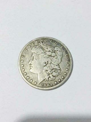 1884 Morgan Silver Dollar,  Really Details Fresh From A Very Old Estate.