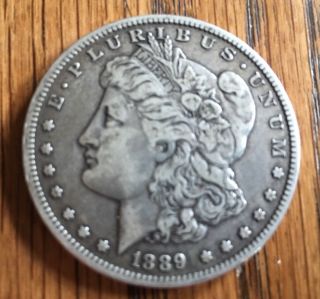 1889 O Morgan Silver Dollar - 90 Silver - Detail - Plastic Round