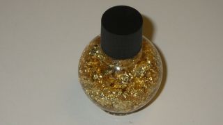 26.  0 Gr Bottle Of Gold Flakes In Water