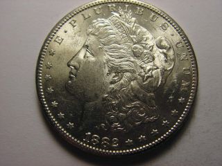 1882 - S Morgan Silver Dollar,  Looks To Be In Pl Unc.  63/64