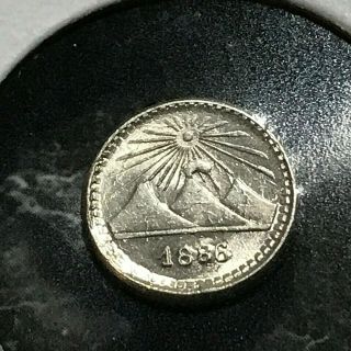 1886 Guatemala Silver 1/4 Reale Volvano Small Brilliant Uncirculated Coin