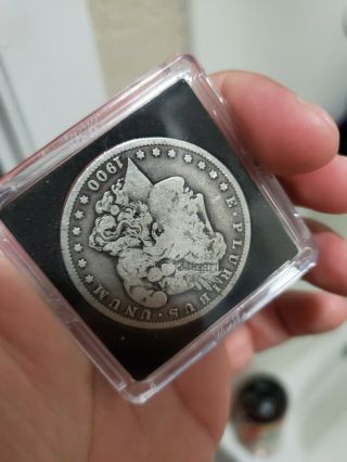 1900 O Morgan Silver Dollar In.  Overall Coin.