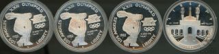 Set Of 4 U.  S.  $1 1983 & 1984 Los Angeles Olympics Commemorative Silver Dollars
