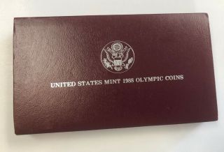 1988 U.  S.  Olympic Proof Silver Dollar,  Box And Papers