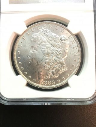 1883 - O Morgan Silver Dollar Ngc Ms62 Light Toning Around Rim Lustrous