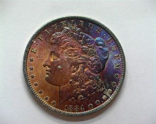1884 - O Morgan Silver Dollar Near Gem Uncirculated Rainbow Toning