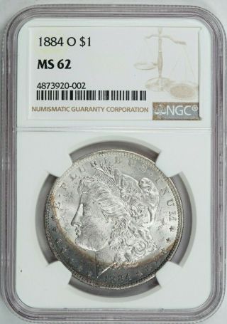 1884 - O Morgan Silver Dollar,  Ngc Ms62,  Crescent Toned Pq Undergraded