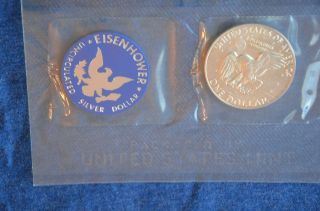 (5) 1974 - S Eisenhower 40 Silver Dollars in Blue Packets 2
