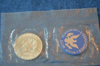 (5) 1974 - S Eisenhower 40 Silver Dollars in Blue Packets 7