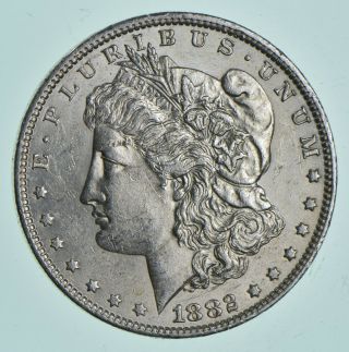 Au/unc - 1882 - O Morgan Silver Dollar $1.  00 142