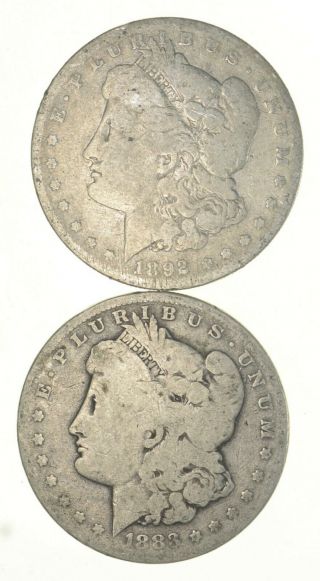 (2) Bullion Grade Morgan Silver Dollars 1892 - S & 1883 90 Silver $1 Coins 823