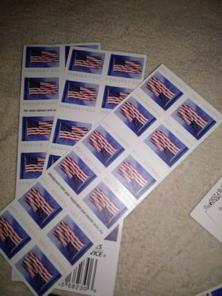 40 booklets of assorted USPS Forever Flag and fireworks stamps.  800 stamps 5