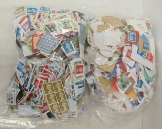 Unsorted 5KG charity stamps mixed UK,  foreign,  franked - TIV SC5 5