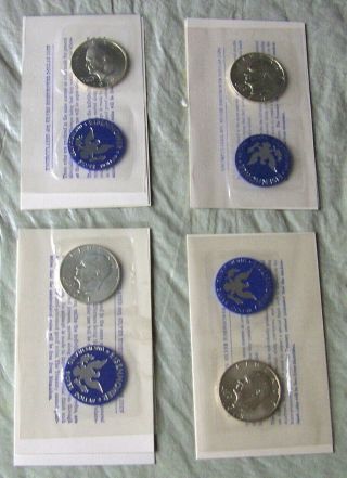 (4) Four Eisenhower Uncirculated Silver Dollars 1971s,  1972s,  1973s And 1974s