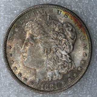1884 - O $1 Morgan Silver Dollar Bu Toned