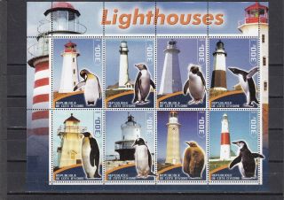 A102 - Ivory Coast - 2003 Mnh Lighthouses & Penguins Miniature Sheet 8v