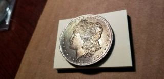 $1 1884 O Silver Morgan Dollar Bu Golden Toning