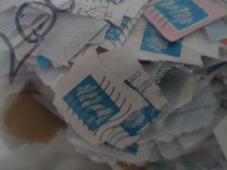 aprox 4000 2nd class GB security stamps on paper approx 750grms 2