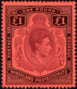 Nyasaland 1938 £1 Purple & Black On Red Paper Sg.  143 (hinged)