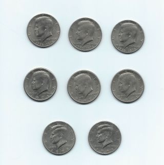 Kennedy Half Dollars - 1971 (3) - 1976 (3) - 1998 (2) - (8 Coins)